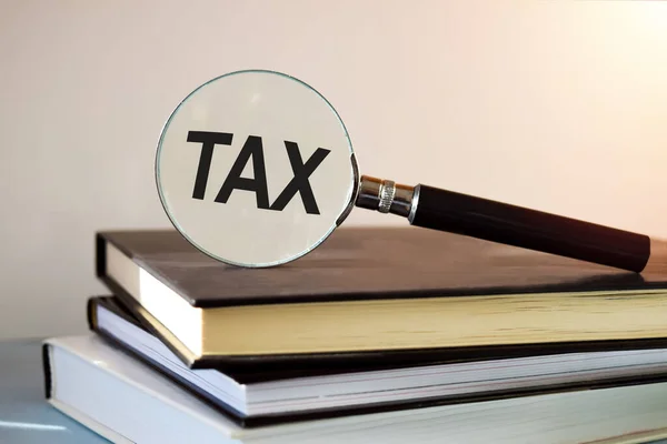 Inscrição Tax Está Escrita Vidro Imortal Que Jaz Nos Livros — Fotografia de Stock
