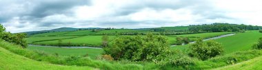 Panoramic of green pastures in County Wicklow, Ireland clipart