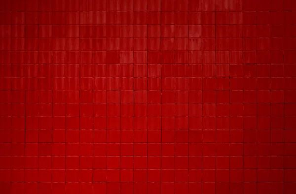 Urban wall with red concrete tiles