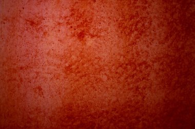 Kırmızı bir arka plan aşınmış doku arka plan