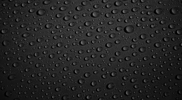 Fundo preto com gotas de água — Fotografia de Stock