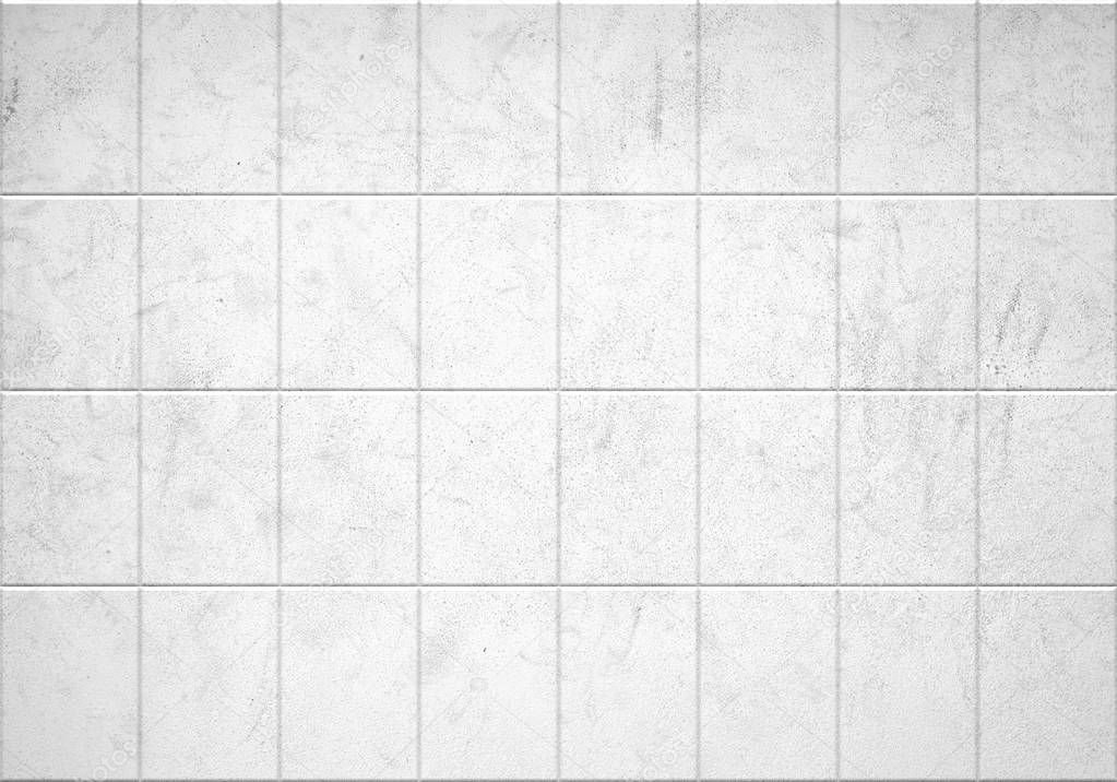 Dirty white wall with tiles