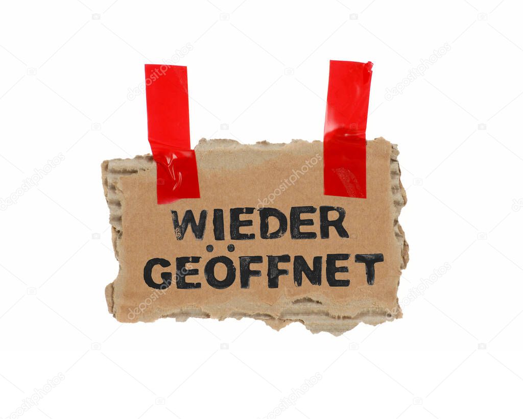 Brown cardboard with red tape showing Reopening in german language