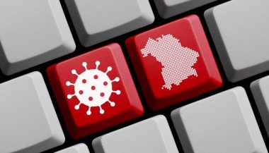 Alman federal eyaleti Bavyera Bayern 'in Coronavirus simgesi ve silueti içeren bilgisayar klavyesi