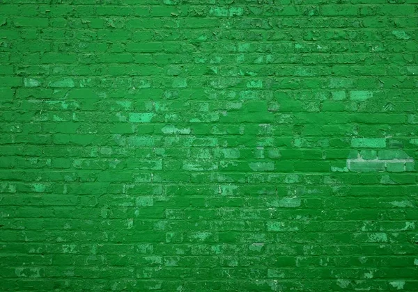 Texture of green grunge brick wall background