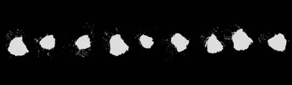 Collection of 9 white dirty color blobs on black background