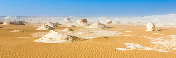 White Desert at Farafra in the Sahara of Egypt. Africa. Web banner in panoramic view.