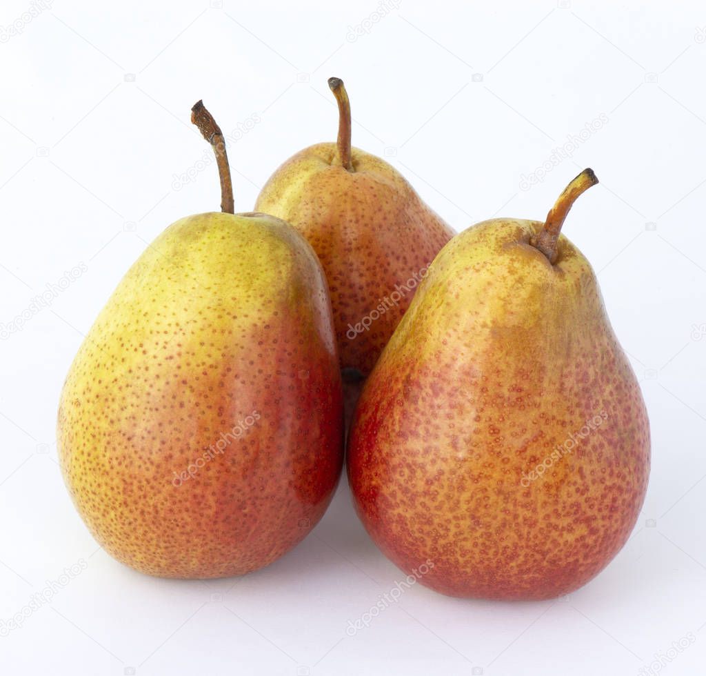 Yellow Trout pears with bright red barrels on a white background with a delicious aroma
