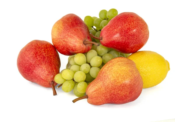 Limão amarelo e algumas peras vermelhas saborosas apetitosas brilhantes com um b — Fotografia de Stock