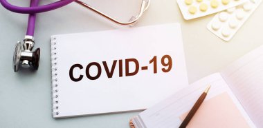 Defterde COVID 19 yazıyor. WHO, COVID-19 adlı Coronavirus hastalığına yeni bir resmi isim verdi.