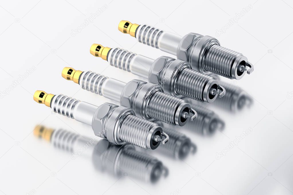 3D Spare parts spark plugs on white background for car and motorcycle