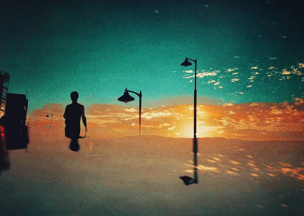 Digitally composed view of a man silhouette and street lights.