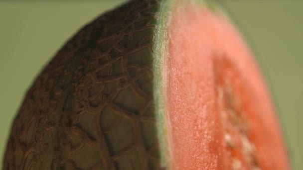 Macro close up of Cantaloupe Melon. Creative rotating macro shot of fresh and healthy summer fruit — Stock Video