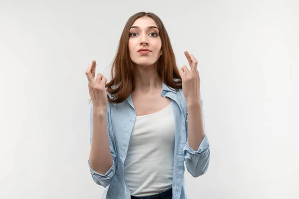 Joyful Young Brunette Female Long Straight Hair Crossed Fingers Makes — Stock Photo, Image