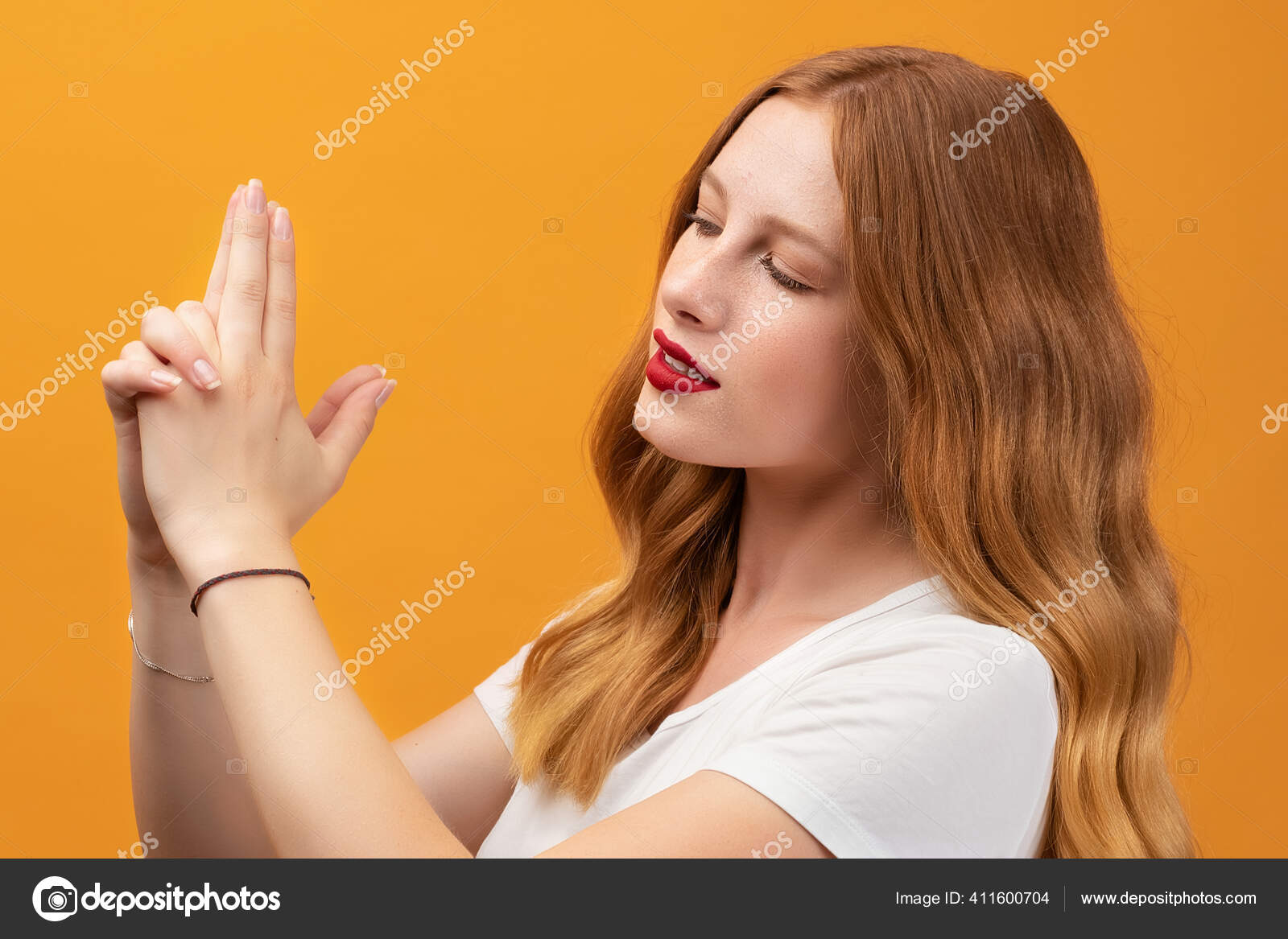 Pretty Girl Wavy Redhead Wearing White Shirt Holding Symbolic Gun