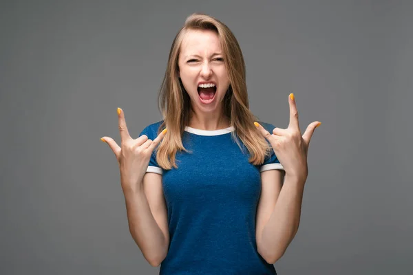 Emotive Young Female Blonde Straight Hair Makes Rock Roll Sign — Stock Photo, Image