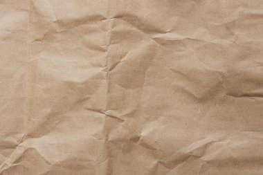 Mesajın için buruşmuş kahverengi kağıt. Kahverengi kağıt dokusu arkaplanı