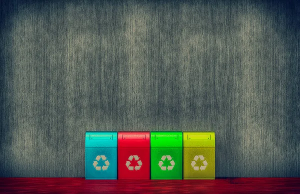 Recycling bin on the wall background.
