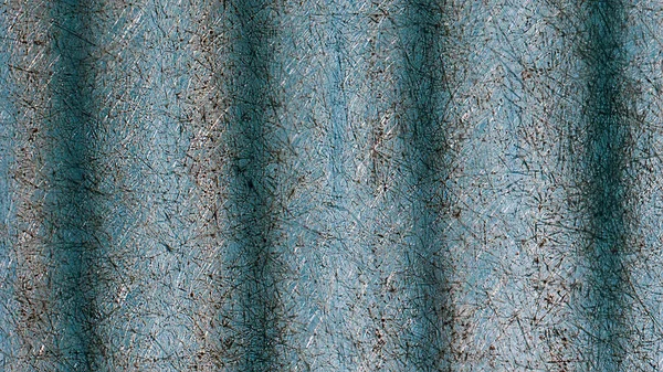 Abstract texture of blue scratched plastic roof tiles.