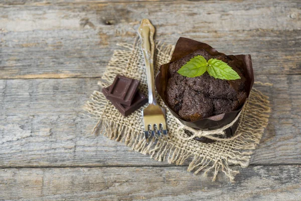 Chocolate mint cake on wooden background Copy space