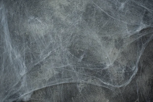 Cadılar Bayramı kavramı, örümcek ağları, tebrik kartı arka plan ile duvar eski bir koyu arka plan.