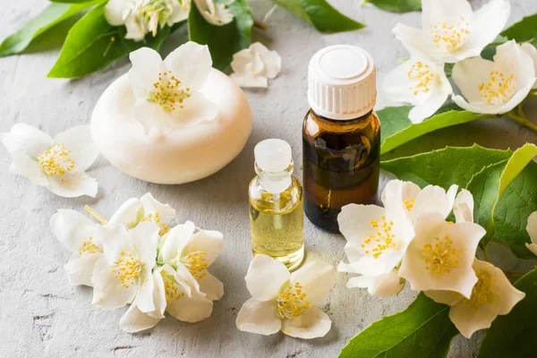 Jasmine oil. Aromatherapy with Jasmine oil and soap. Jasmine flower.