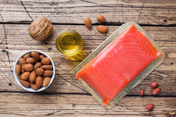 Концепция Здорового Питания Антиоксидантные Продукты Рыбные Орехи Масло Деревянном Фоне — стоковое фото