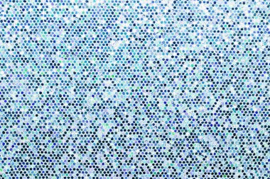 Mavi arka plan. Soyutlama parlak pullu. Pullu doku closeup makro.