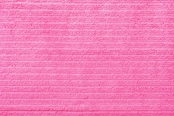 Pink texture of bath towels. Textured background.