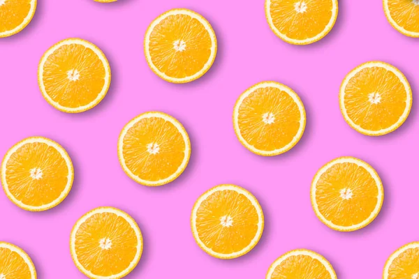 Бесшовный Рисунок Сочных Оранжевых Ломтиков Розовом Фоне Плоский Вид Сверху — стоковое фото