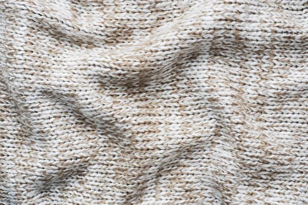 Zbliżenie Beżowy Sweter Dzianiny Naturalnej Wełny Tekstury Falowane Fałdy Selektywny — Zdjęcie stockowe