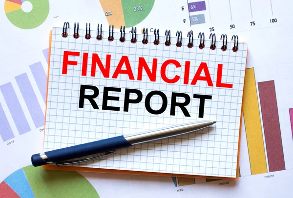 Notatnik Tekstem Raport Finansowy Wykresach Biznesowych Długopisem — Zdjęcie stockowe