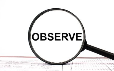 Finansal tablolarda OBSERVE yazılı büyüteç