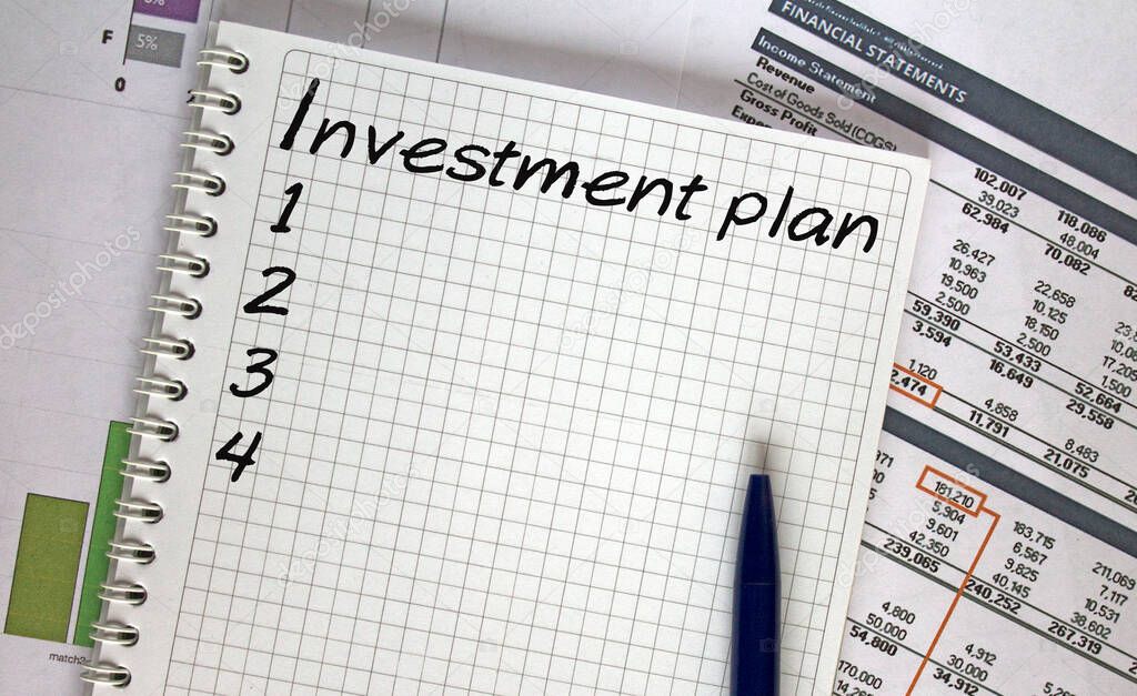 Investment plan. Financial planning on notebook, business and finance concept.