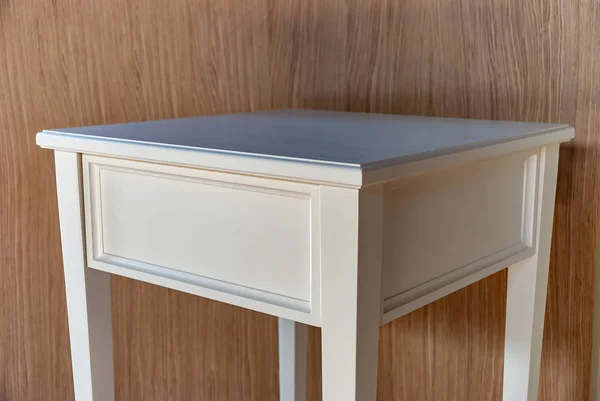 White bedside table in solid wood with drawer