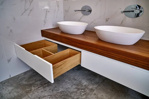 Luxury bathroom vanity. Stylish interior of modern bathroom with teak tabletop and marble walls — Stockfoto