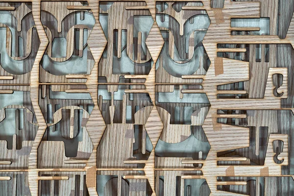 Corte por láser de madera. Panel decorativo de madera con ornamentos geométricos tallados —  Fotos de Stock