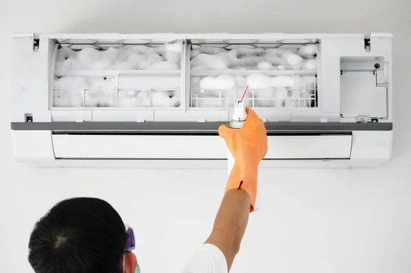 air conditioner cleaning with spray foam cleaner