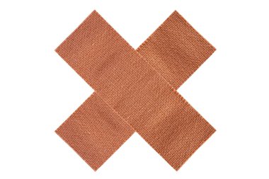 Yapışkan tıbbi kumaş alçı ilk yardım ekipmanı beyaz arka planda izole edildi