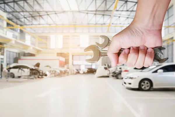 Auto Mechanic Hand Holding Wrench Car Repair Service Centre Garage — Stock Photo, Image