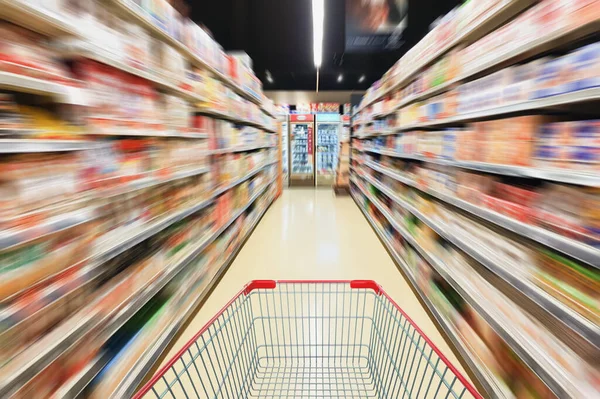 Supermarkt Gangpad Bewegingsvervaging Met Lege Winkelwagen — Stockfoto