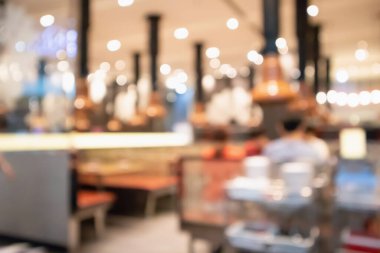 Kore barbekü lokantası. Arkaplanı bokeh ışığıyla bulanık.