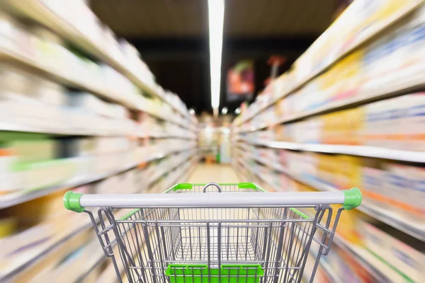 Carro Compra Vacío Con Pasillo Borroso Del Supermercado Con Producto —  Fotos de Stock