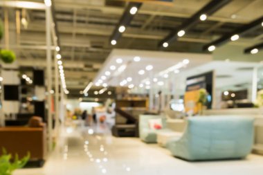 Ev dekorasyonu mobilya galerisindeki soyut bulanık kanepe montaj ürün gösterimi için bokeh ışığı arka planına sahip.