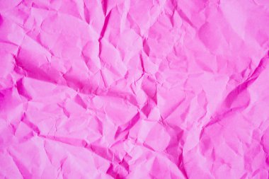 Buruşmuş pembe kağıt dokusu arkaplanı