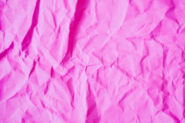 Buruşmuş pembe kağıt dokusu arkaplanı