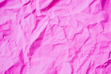 Buruşmuş pembe kağıt dokusu arkaplanı