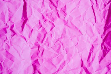Buruşmuş pembe kağıt dokusu arkaplanı