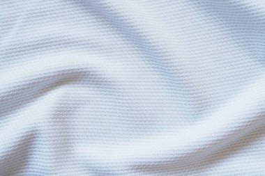Beyaz futbol forması kumaş kumaş dokuma spor giysisi arka plan, yakın çekim