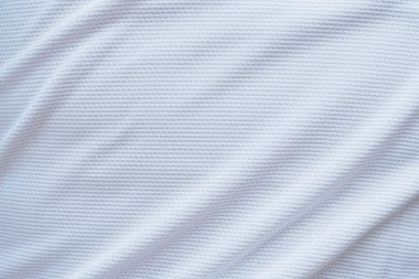 Beyaz futbol forması kumaş kumaş dokuma spor giysisi arka plan, yakın çekim